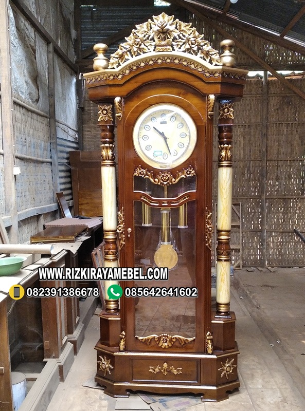 Lemari Jam Hias Ukiran Emas Natural